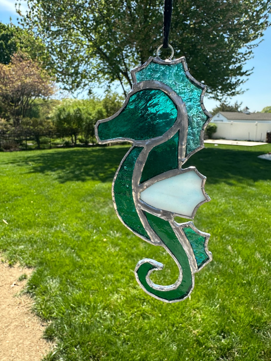 Green iridescent stained glass seahorse suncatcher